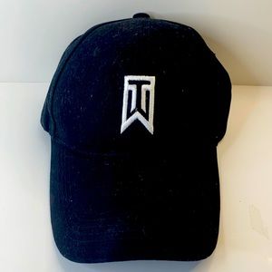 Black TIGER WOODS hat, with white lettering.
